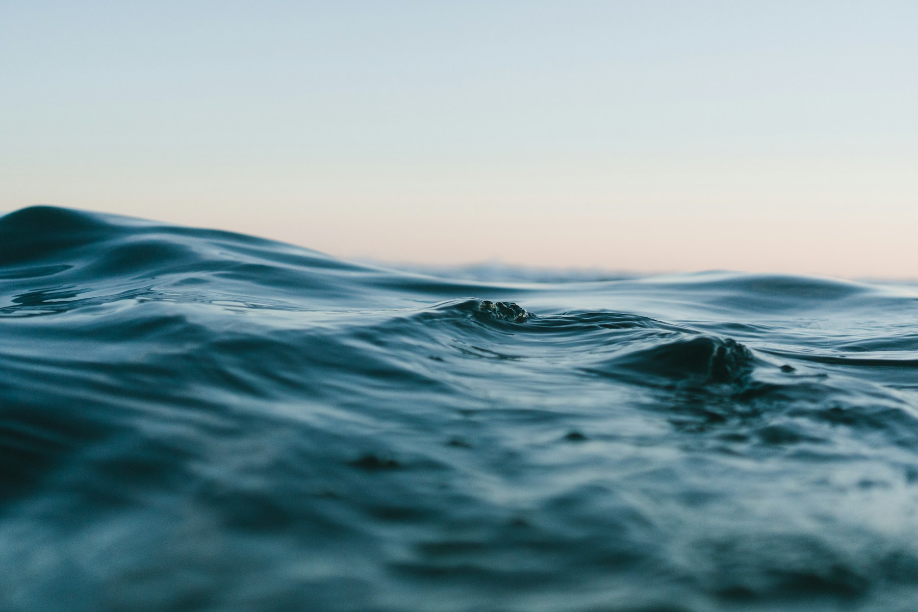 Calm coastal waters in the soft evening light